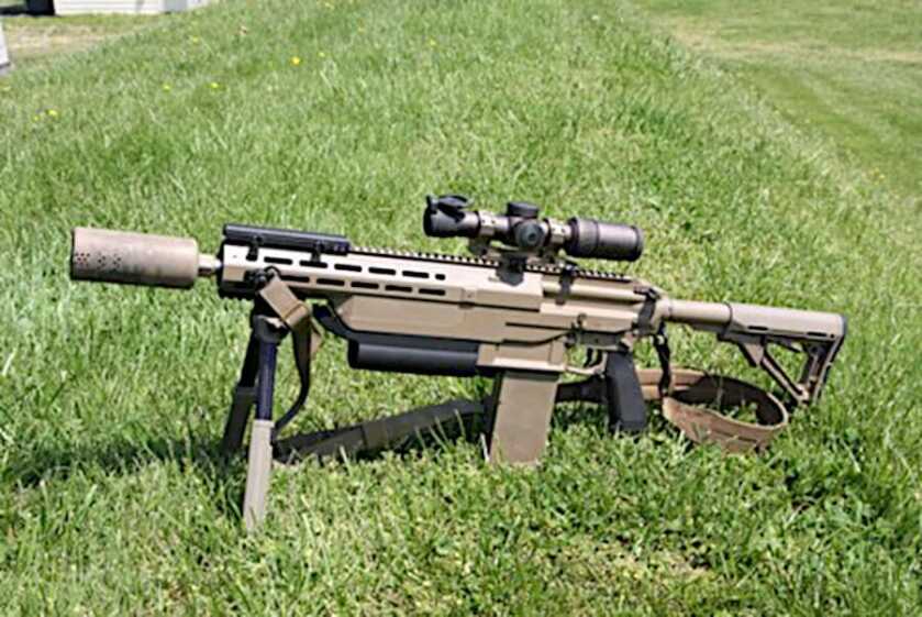 Army Testing 'the Smuzzle,' a New Hard-Use Hybrid Muzzle Device Army Testing 'the Smuzzle,' a New Hard-Use Hybrid Muzzle Device