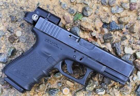 Learning to Shoot a Handgun with a Red Dot: Simple but not Easy Learning to Shoot a Handgun with a Red Dot: Simple but not Easy