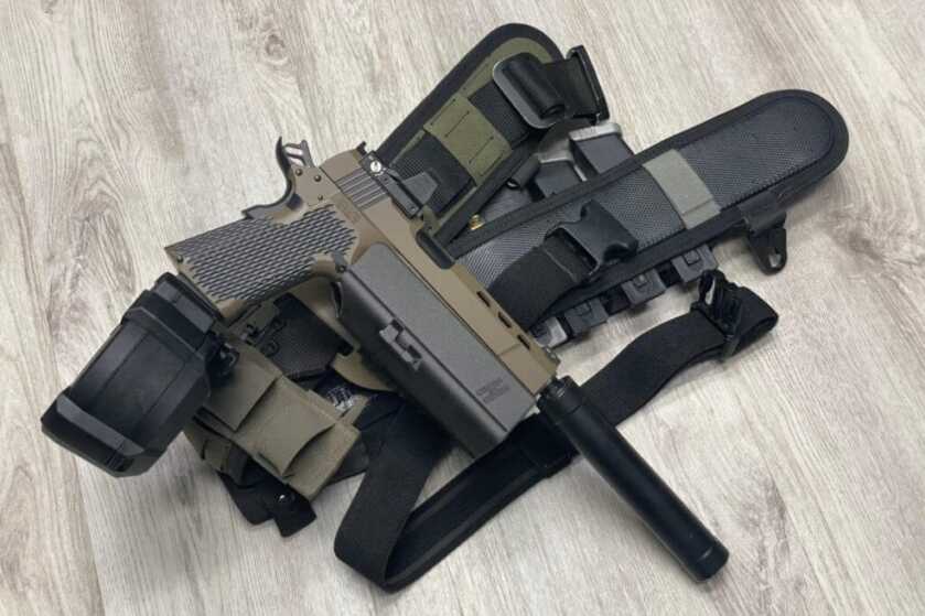Review: 1911 That Takes Glock Mags?! Meet the Stealth Arms Platypus Stealth Arms Platypus with Hush Holsters and suppressor