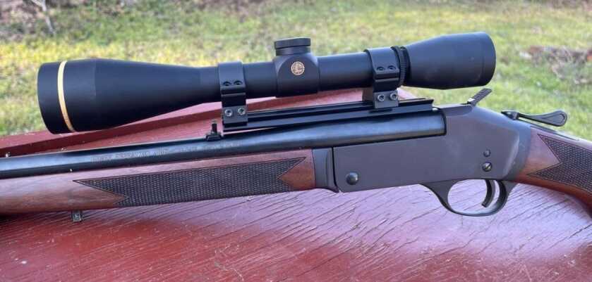 Henry Single Shot Rifle in .243 Winchester topped with a Leupold Scope.