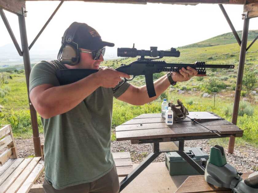 Tombstone 9mm: POF's Classic Lever Action with AR Styling POF Tombstone 9mm shot handheld by a pleased-looking man in a baseball hat.