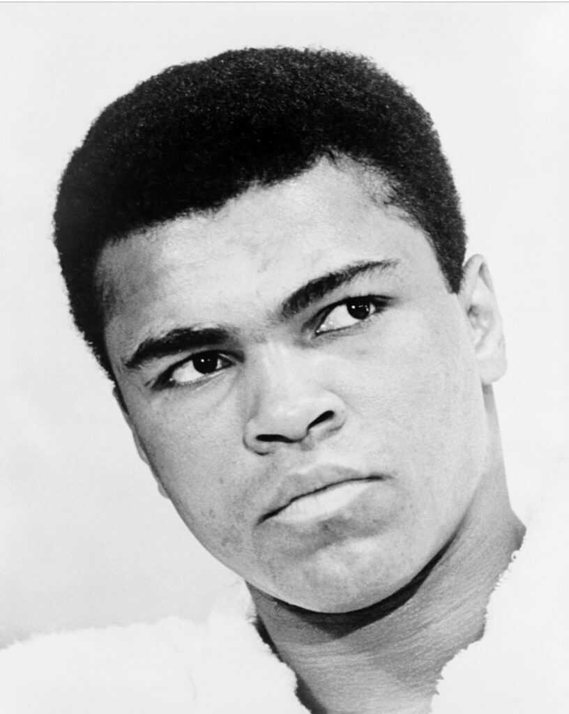 black and white headshot photo of Muhammad Ali