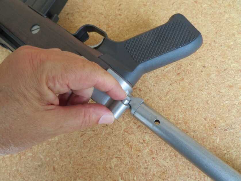 A button at the base of the Samson A-TM stock needs to be pressed to fold the stock.