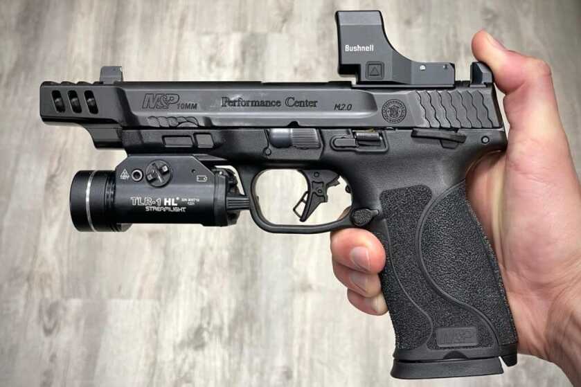 S&W Perfomance Center 10mm topped with the Bushnell RXM-300 red dot and the Streamlight TLR-1 HL wewaponlight
