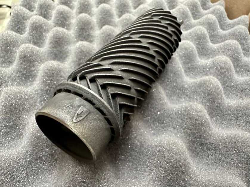 The inner core of a suppressor lays on a foam pad.