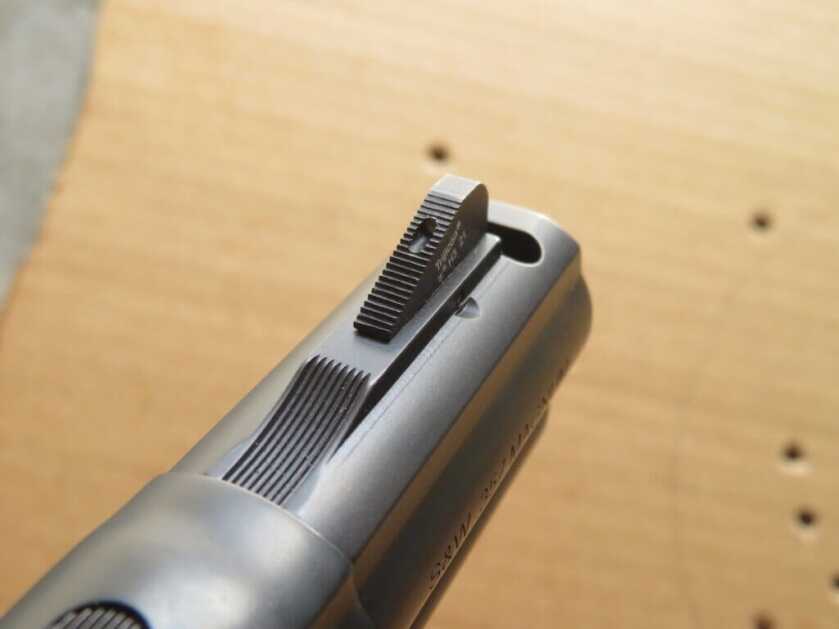 Smith and Wesson Performance Center Model 19 Carry Comp with Trijicon front sight.