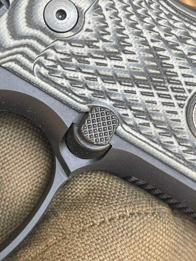2 - Wilson Combat Beretta 92G Closeup on beautiful extended magazine release