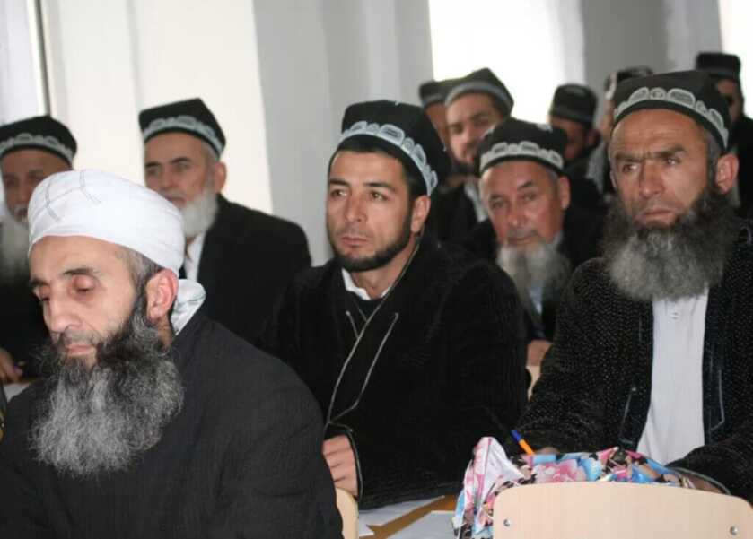 men sitting in a room