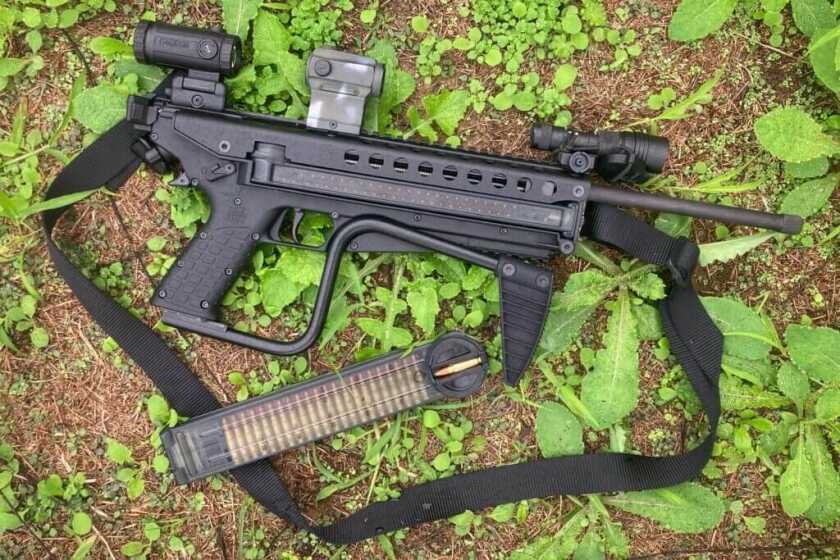 KelTec R50 on ground with spare mag