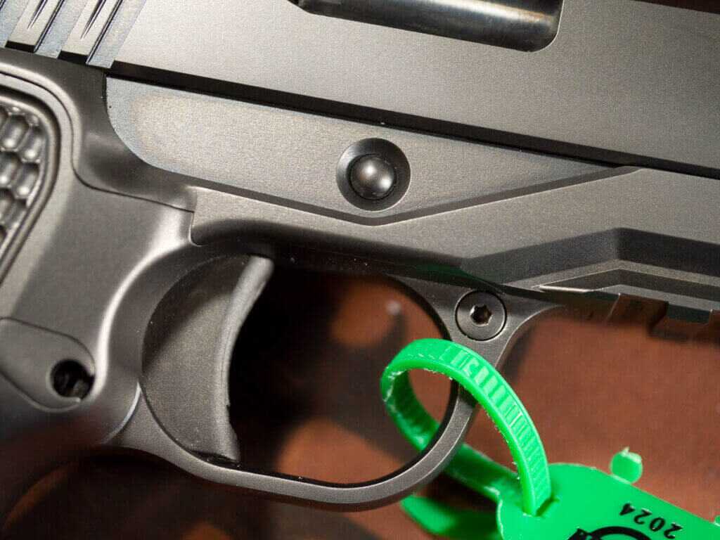 Close up view of the right side of the trigger area. the gun is pointed right.
