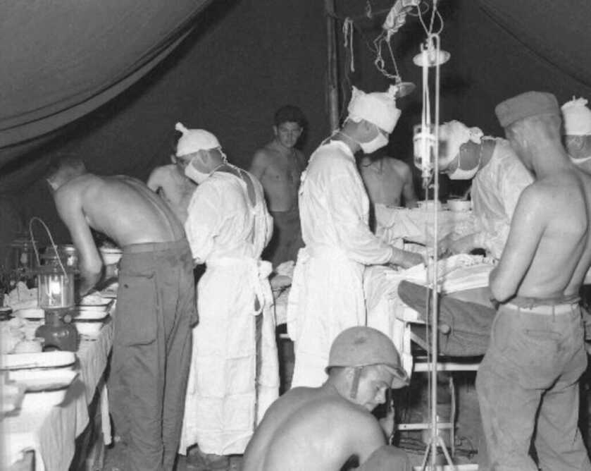 a battalion aid station with medical staff and soldiers