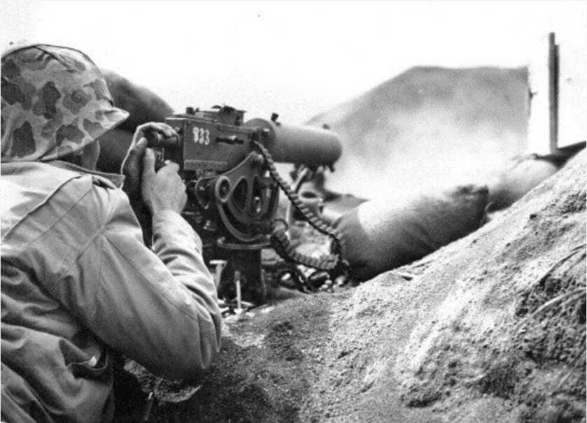 Benjamin Salomon: Rambo Dentist black and white photo of man with machine gun