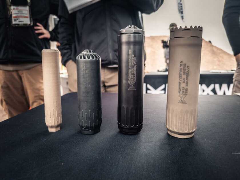 Suppressors on display at SHOT Show 2024.