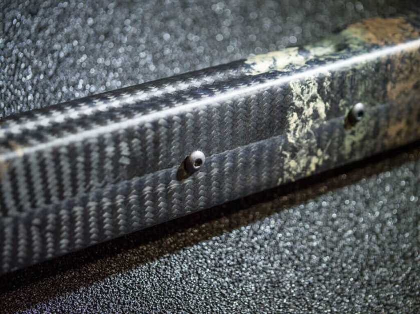 Close up view of the Manners stock showing the mounting holes for tripod plates.