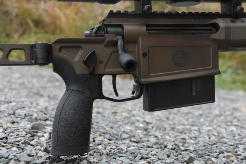 Closeup view of a rifle receiver.