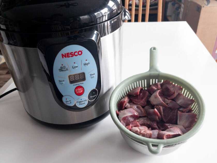 Nesco pressure cooker with bear meat
