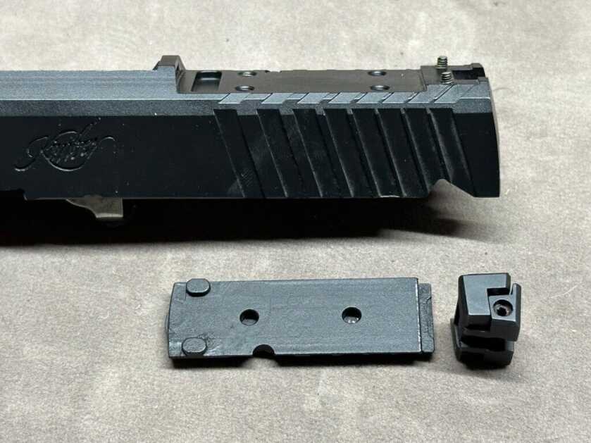 The Kimber KDS9C optics plate has been removed.
