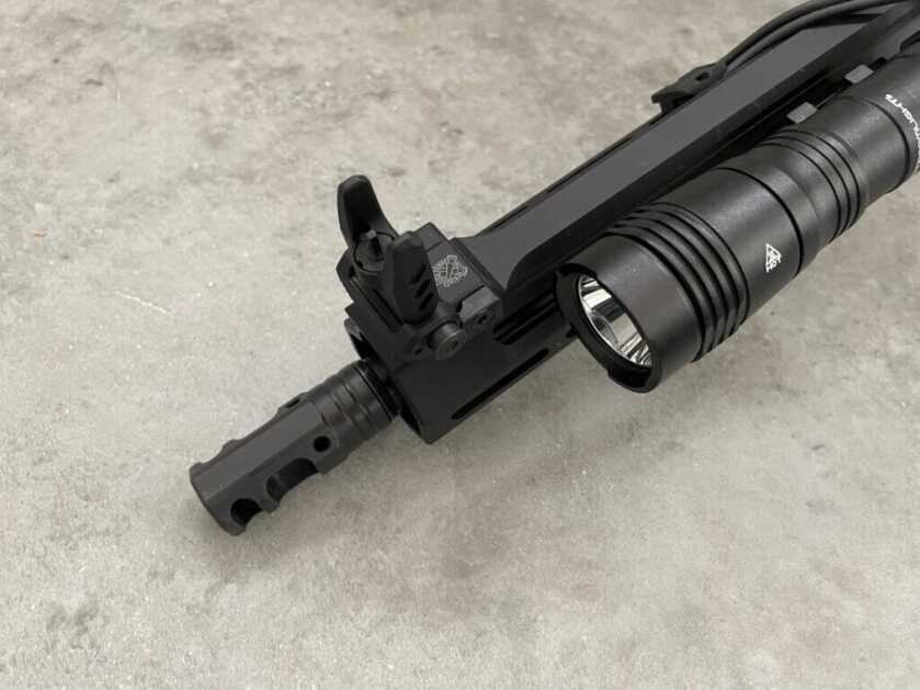 Tactical light mounted to MLOK rail.