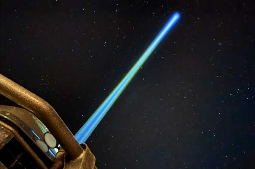 Beam of W4Pro TAC flashlight shining up into a dark sky