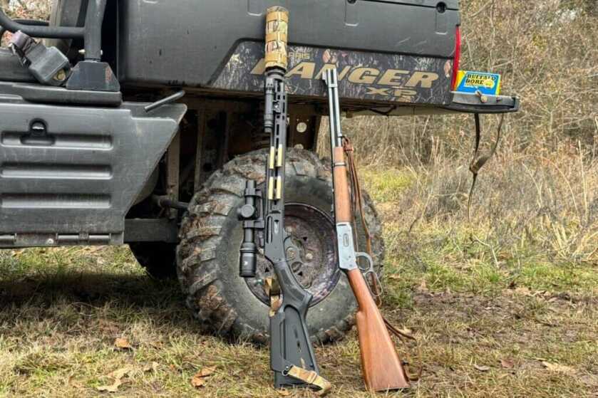 Two guns next to each other leaned against Ranger