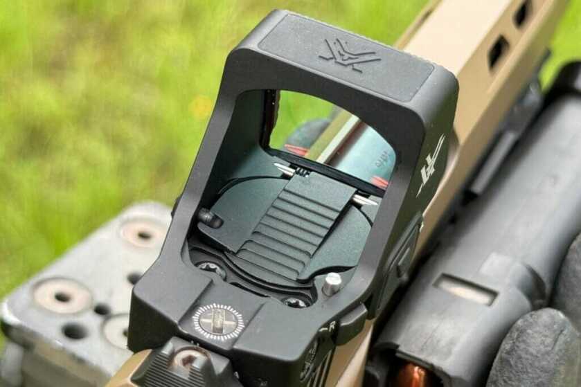 The Vortex Defender-XL mounted on a beige handgun