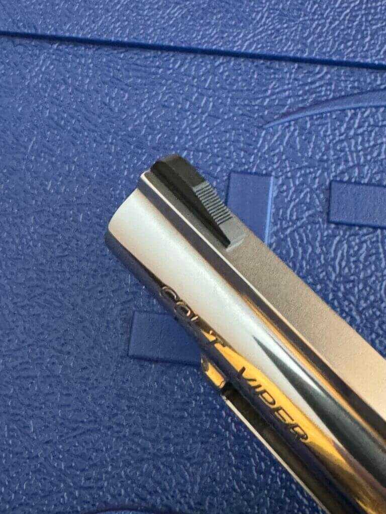 Serrated black front sight on Colt revolver