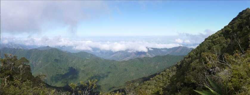 Cuban landscape with mountains, clouds, and blue sky