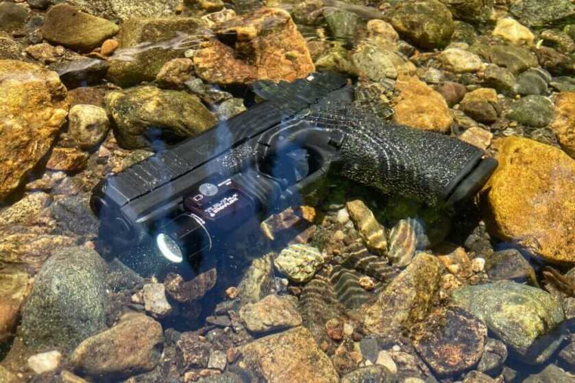 Streamlight TLR-7 HL-X mounted to pistol underwater in stream