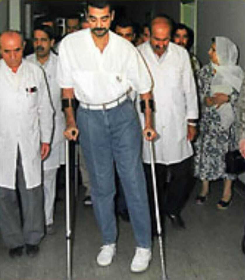 man with arm crutches