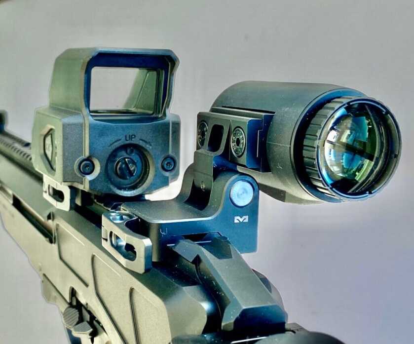 Tru-Vision red dot and Meproguard MMX3 Magnifier mounted to a rifle