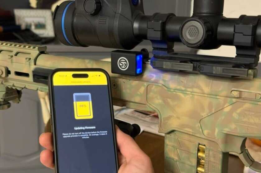 Phone and rifle with scope