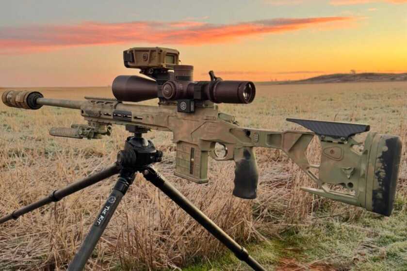 SG PLUSE mounted on a scope in front of wheat field and sunset