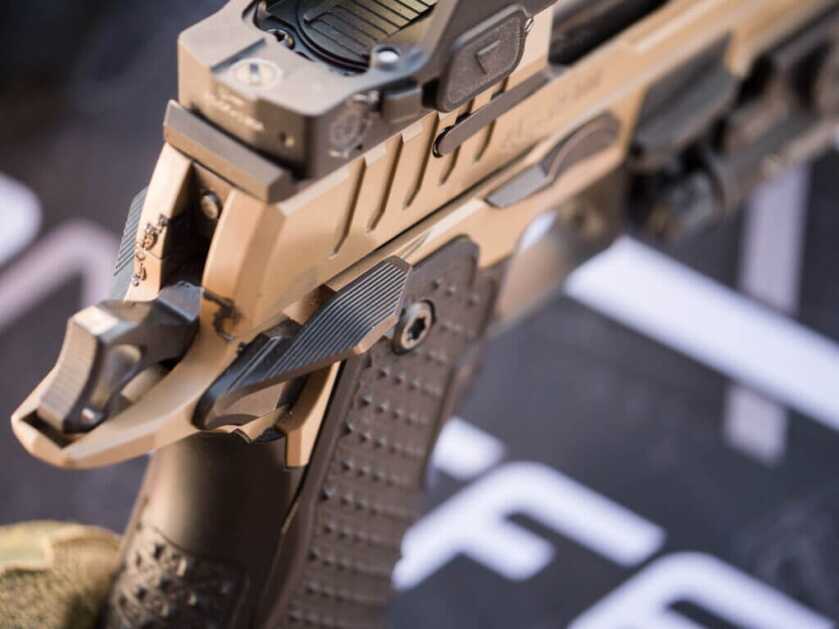 Close up view of the right side rear safety lever.