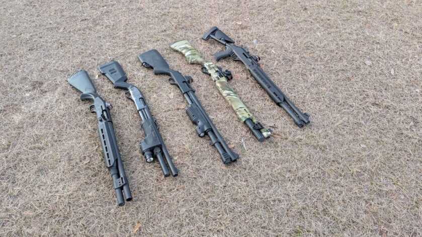 Home defense shotguns in a line