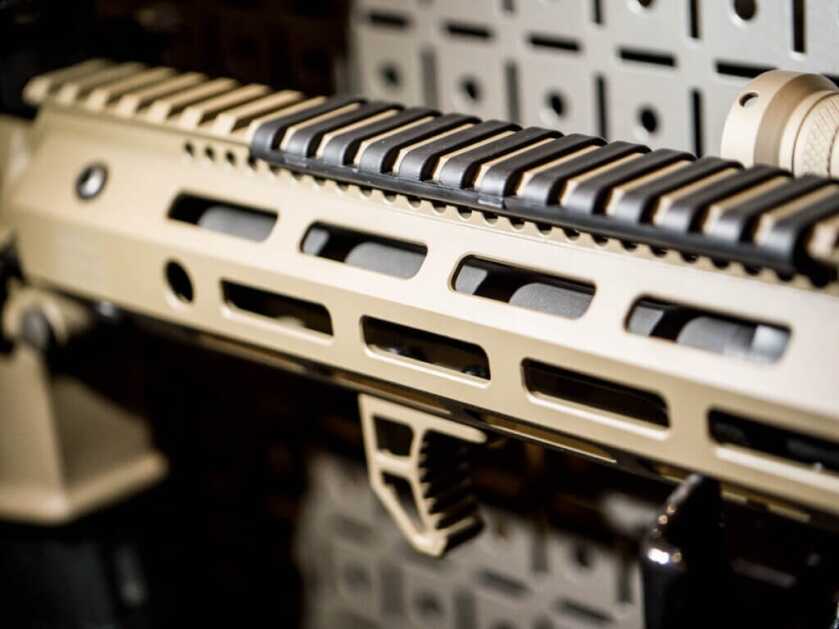 Close up of the handguard with a hand stop underneat.