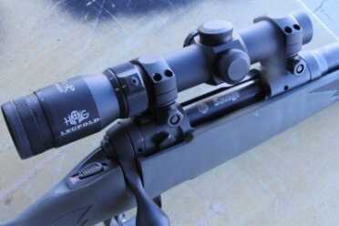 savage-hog-hunter-rifle-receiver-leupold-scope The review rifle at Media Day at the Range, SHOT Show 2012 had a Leupold Hog scope on it. It is a 1.25-4 power optic with an LED powered center dot.