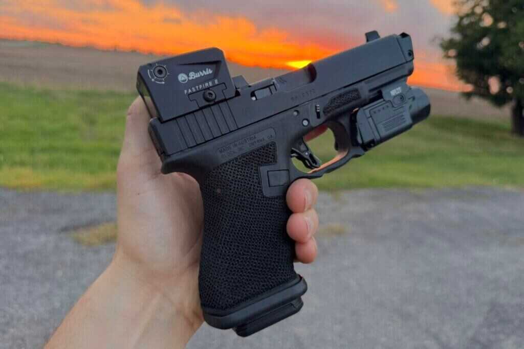 Hand holding pistol 