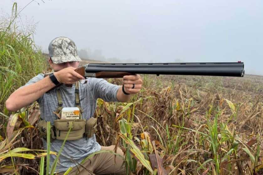 man with shotgun