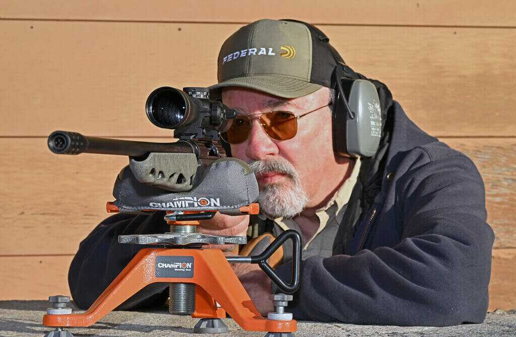Author holding Benelli Lupo Alpha rifle after field testing the lightweight hunting rifle