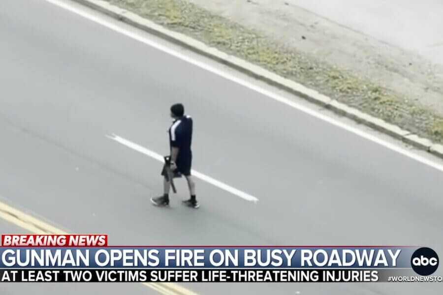 The suspect known as Tyler Brown shooting in the streets.