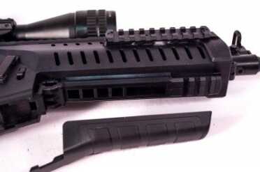 Beretta's ARX100: A Closer Look The bottom cover pops off to reveal a proprietary rail for grenade launcher attachment.
