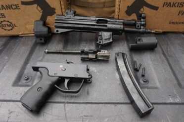 MP-5 Clone from Pakistan - Pakistani Ordnance Factory’s POF-5 Take-down is easy. This makes cleaning, even in the field, much easier.