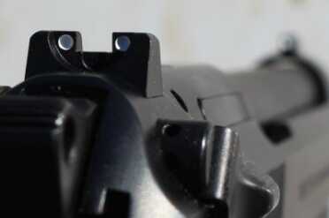 In Defense of the Beretta M9 The rear sight is adjustable.