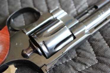 The cylinder opens when this latch is slid back.