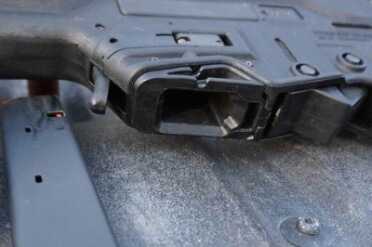 The 9mm mag block slides into the existing mag well.