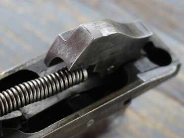 Hammer and spring.