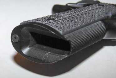 The generous and well-beveled magazine well extension makes reloads a snap.