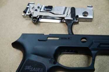 SIG SAUER P320 Grows up – to .45 ACP (Review) Removable serialized chassis/frame/FCU = gun (top). Gun-shaped polymer parts and slide assembly - not a gun.