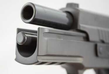Brand New from Sig--Legion 9mm Pistol--Hands On Review Note the polished steel guide rod for extra weight up front and to smooth out the action.