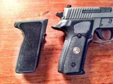 Brand New from Sig--Legion 9mm Pistol--Hands On Review The new G10 grips are ever so slightly larger around than the standard one-piece P229 grips.